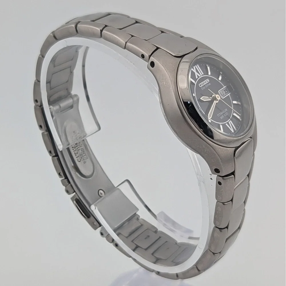 Citizen Eco-Drive Titanium E001-K18451 Women's WR100 Day Date Black Dial Watch